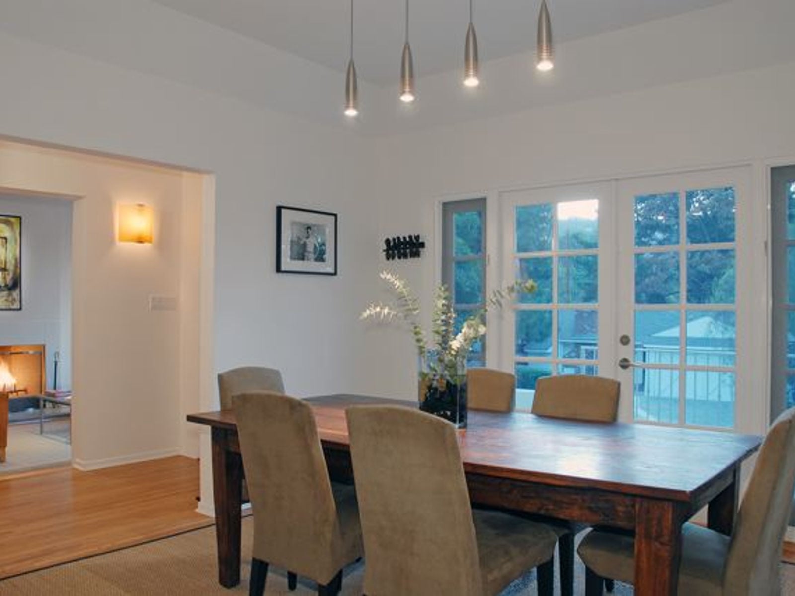 Mulholland residence — dining room with modern lighting after renovation